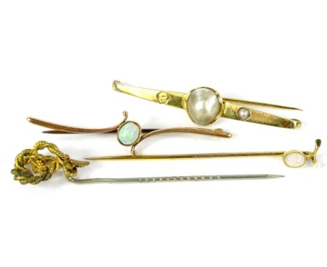 Four stick pins and bar brooches, comprising an opal and seed pearl set pin, yellow metal, unmarked, 6cm high, another stick 