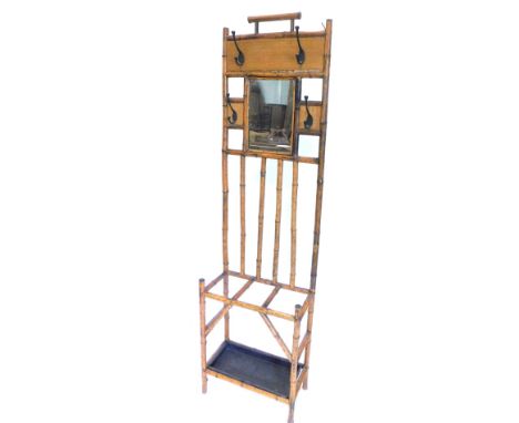 A late 19th/early 20thC bamboo hall stand, with a rectangular mirror plate, four hooks, the bamboo with in sized oriental dec
