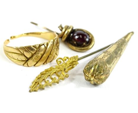 A small quantity of jewellery and trinkets, to include a dress ring, yellow metal, unmarked and cut, 3.8g, two stick pin head