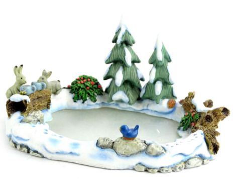 A Goebel Icy Adventure stand, with original box. 