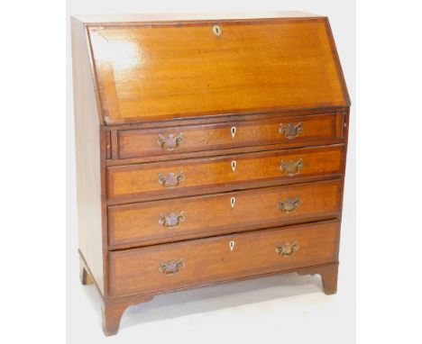 An early 19thC oak and mahogany cross banded bureau, with a fitted interior, above four graduated drawers, on bracket feet, 1