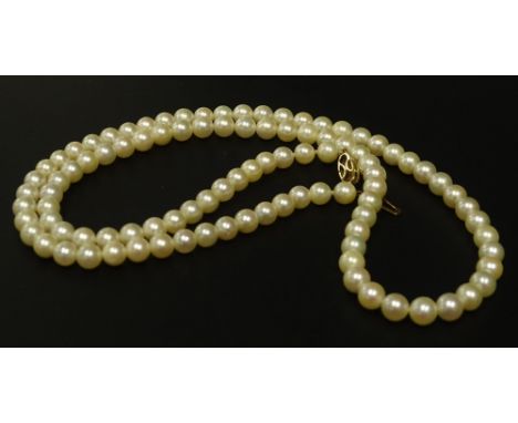 A single strand cultured pearl necklace, the pearls 6mm W, with 9ct gold clasp, 62cm L overall, in Ratners Jewellers of Value