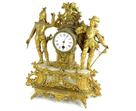 A late 19th/early 20thC French gilt metal and alabaster mantel clock, mounted with two figures of soldiers, flanking a centra