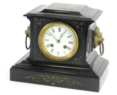 A late 19thC French black slate and parcelled gilt mantel clock, the enamel dial with Roman numerals, the case with gilt meta