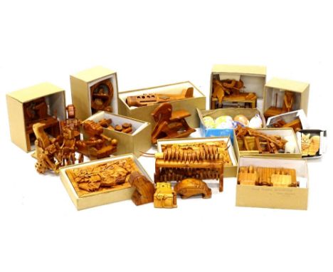 A large quantity of handmade wooden automaton toys, painted surprise eggs, etc., to include an airplane, a drumming crocodile