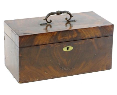 A George III flame mahogany tea caddy, of rectangular form with part fitted interior, and fixed metal carrying handle, 19cm H
