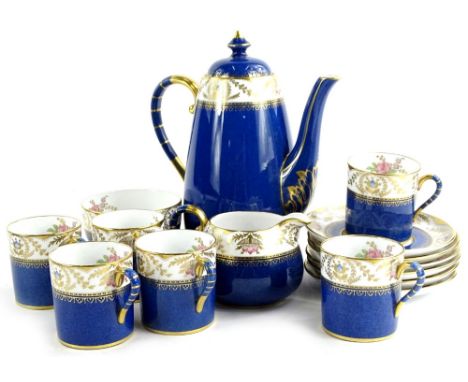 A Spode Copeland part coffee service, decorated with flowers in gilt on a white ground above a mottled blue band, to include 