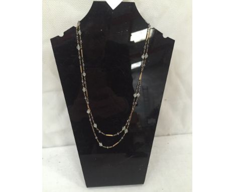 An Edwardian gold, moonstone and amethyst necklace