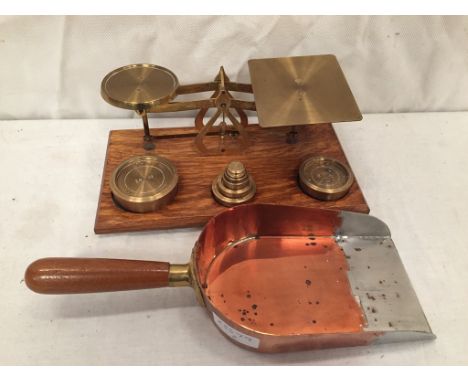 A set of scales; together with a coin shovel (warranted scales) c1950