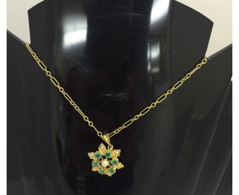 A 9ct emerald and pearl pendant on gold chain