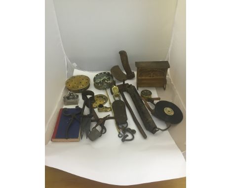 A box of odds to inc HMV aluminium dog, Salters scales, shears, walking sticks, old farming implements, tools, cow teat cover
