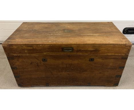 A vintage large fruitwood trunk with brass handle, corner bindings and inlay to lid. Double lock and brass key escutcheons. S