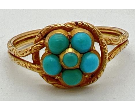 An antique gold lovers knot ring with engraved detail to band and 5 central round cut turquoise stones. Size P, total weight 