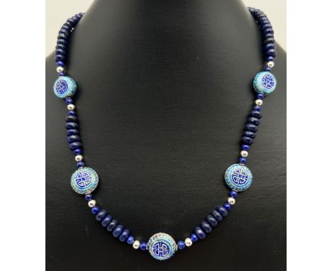 A 17" lapis lazuli and enamelled Chinese beaded necklace with silver tone magnetic barrel clasp. Retired jewellery makers sto