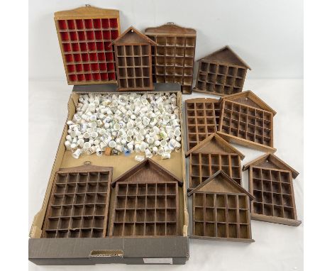 Large wooden thimble display case and various thimbles including glass,  souviner, metal etc.