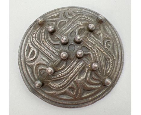 A large metal circular Celtic design brooch/cloak pin. Makers mark to back. Approx 5.5cm diameter. 