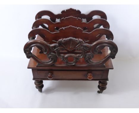A Victorian Mahogany Canterbury, the Canterbury having three sections with shell design to front pierced panel, single drawer