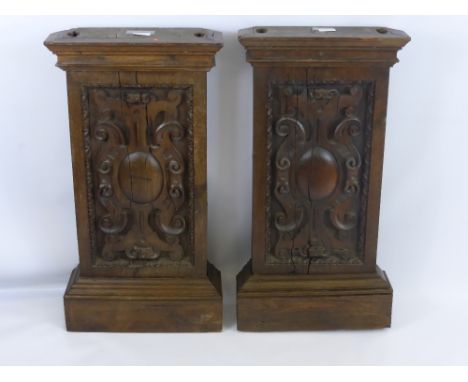Three Antique Carved Oak Panels, together with a carved stained oak panel with carved floral design.