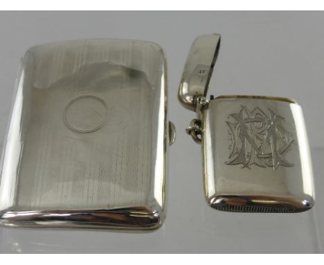 A Solid Silver Double Cigarette Case, having gilded interior, Birmingham hallmark, dated 1915, m.m rubbed,together with a sol