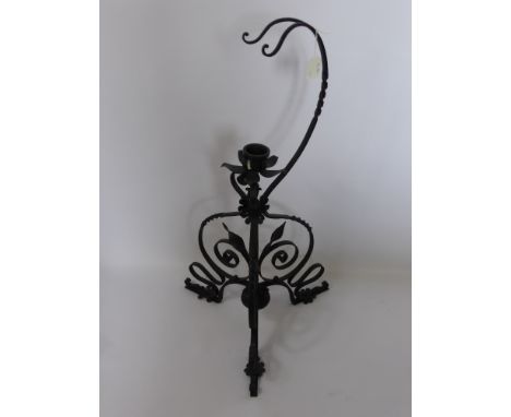 An Antique Wrought Iron Candle Stand, the candle stand supported on tripod base, approx 78 cms