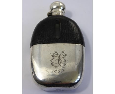 A Victorian Silver plated Hip Flask, the flask engraved 1899 and initialed EC.