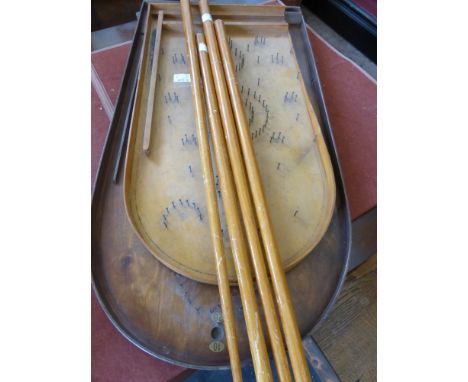 Two Antique Bagatelle Boards with four cues. (6)