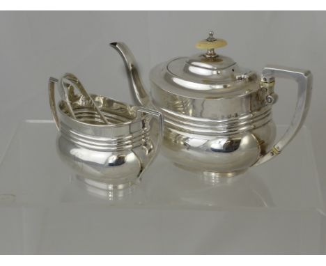 A Solid Silver Bachelor Tea Pot and Sugar Bowl, Birmingham hallmark, dated 1902, m.m L & S, the tea pot with ivory finial bot