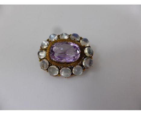 An Antique Silver Gilt, Amethyst and Blue Moon Stone Brooch, amethyst 14 x 10 mm 12 x 4.5 mm moonstone. 