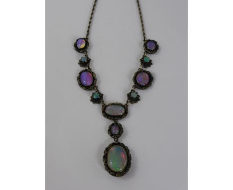 A Vintage Silver and Synthetic Opal Drop Necklace Pendant, the pendant having 4 x 5 mm opal doublet, approx length of drop 24