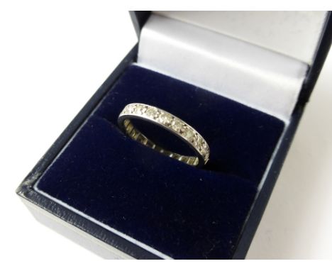 A Lady's White Gold and Diamond Full Eternity Ring, size K, approx 2.3 gms