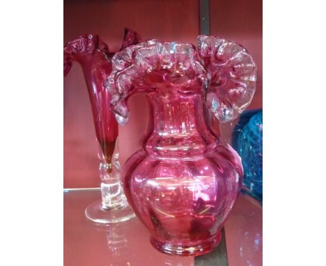 Two Ruby Glass Vases, with crimped edges, both 21.5 cms high together with two black and white trinket dishes, one with base 