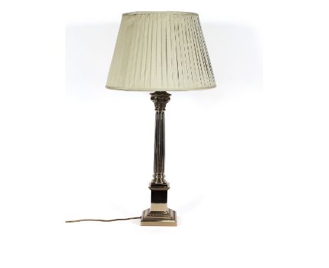 A large plated Corinthian column table lamp, having pleated shade