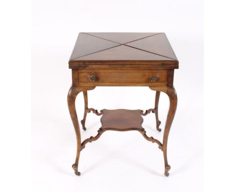 An Edwardian mahogany envelope card table, fitted single drawer, raised on cabriole supports united by an under-tier, termina