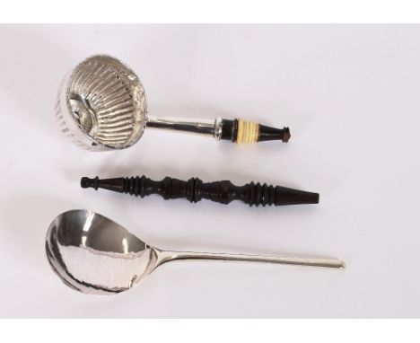 An 18th Century silver mote spoon, marks indistinct; and a silver Tody ladle, bowl inset with an Antique coin, having turned 