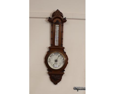 An Edwardian walnut aneroid barometer, by W.H. Harling, 47 Finsbury Pavement, London, 90cm