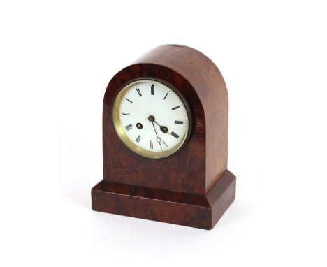 A Victorian walnut cased mantel clock, having circular Roman numeral dial and 8 day movement, 24cm high