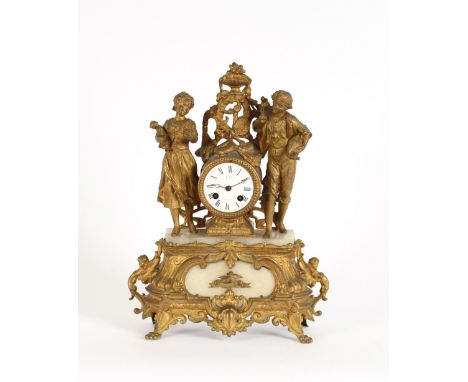 A 19th Century gilded Spelter and alabaster French mantel clock, surmounted by figures of a boy and girl carrying a doll and 