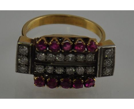 A ruby and diamond plaque dress ring, pave and claw set in an 18 carat yellow gold band