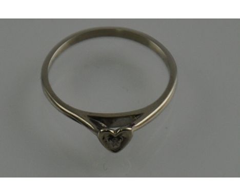 A 14ct white gold diamond heart promise ring