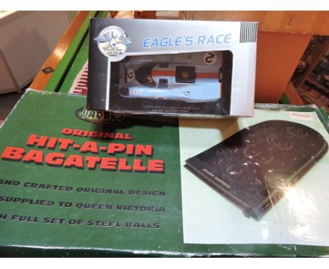 A boxed Jacques bagatelle, together with a scale model Porsche