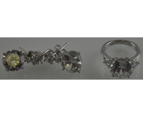 A pair of cubic zirconia  drop earrings together with a large cubic zirconia solitaire ring