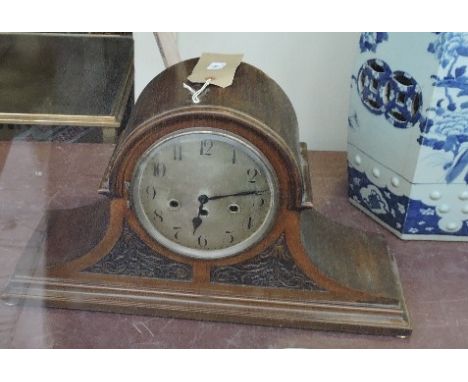 A large 1920s mahogany 8 day chiming mantle clock, the circular silvered dial marked Arabic Numeral h:36cm