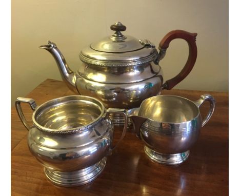 Silver teapot and sugar basin 1976 Adie bros. with near match creamer 32 ozt total weight