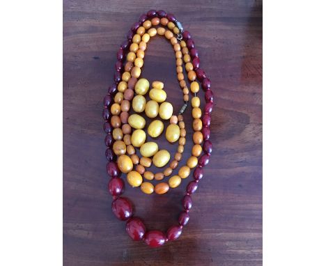 Vintage amber beads 1 string of dark amber 60cm long 44.8gms and 2 strings of butterscotch together with 14 various loose bea