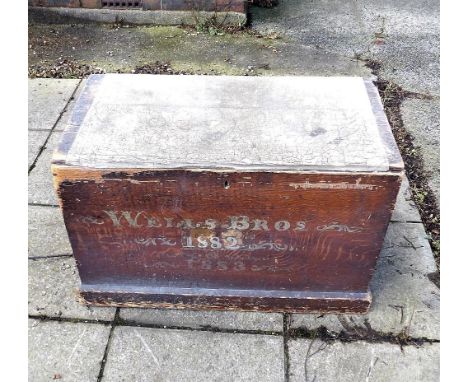 Pine travelling trunk painted with Wells Brothers 1882-1883