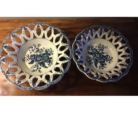 Two 18th c Worcester blue and white Pinecone pattern circular chesnut baskets the reiculated borders and flower bosses 1 29.5