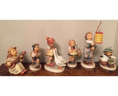 Six Hummel figures 1slight chip inc "Playmates" "Parade of lights" "Sounds of the Mandolin"  etc.