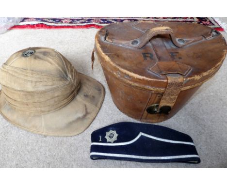 Leather top hat case with Christies top hat, a pith helmet and Boys Brigade beret