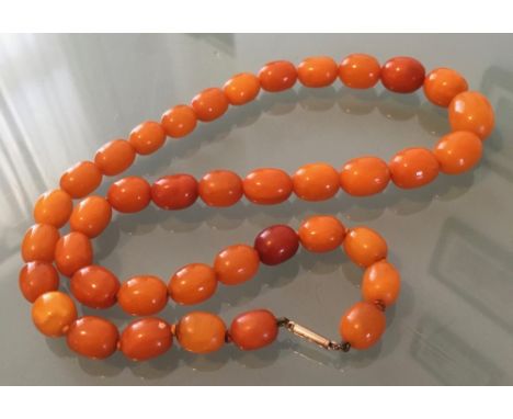 Vintage butterscotch amber necklace 56 cms long 47.5 gms