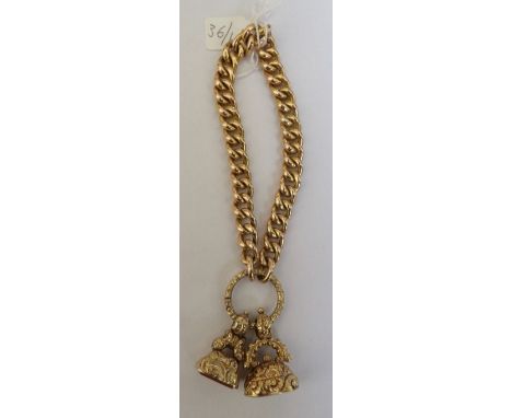 Good quality 15ct chain bracelet hardstone intaglio fob and another 35.9 gms total